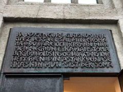 03C Above the main entrance door is a verse from hymn 24 of the passion Hallgrimskirkja Church Reykjavik Iceland