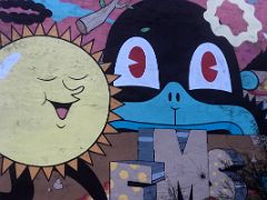 06B Colourful quirky characters including the sun detail by Dabs Myla and Kems Street Art Reykjavik Iceland