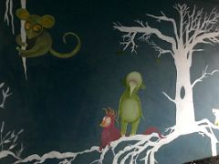 21B Birds on tree limbs and a monkey mural detail Street Art Reykjavik Iceland