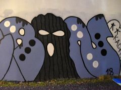 25 Strange shaped heads with slogan kaching Street Art Reykjavik Iceland