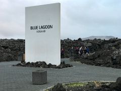 01A The Blue Lagoon Iceland sign is surrounded by lava rocks at the geothermal spa