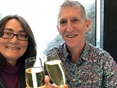 04B Charlotte and Jerome Ryan enjoy a glass of sparkling wine at lunch at LAVA Restaurant Blue Lagoon geothermal spa Iceland