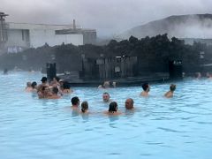 06A People enjoy the hot blue refreshing water from LAVA restaurant Blue Lagoon geothermal spa Iceland