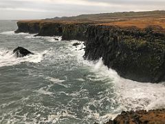 02A The sea hits the cliffs of basalt columns in Arnarstapi Snaefellsnes Peninsula Iceland