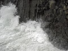 02B The sea pounds the cliffs of basalt columns close up in Arnarstapi Snaefellsnes Peninsula Iceland