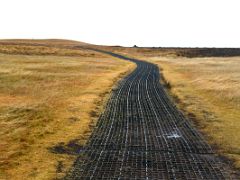 08B A metal walkway to Londrangar on Snaefellsjokull National Park Snaefellsnes Peninsula Iceland