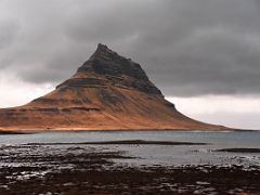 01C Looking across the water to Kirkjufell Church Mountain driving on road 54 from Grundarfjordur Snaefellsnes Peninsula Iceland