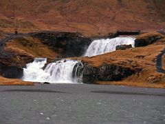 04A Kirkjufellfoss has two waterfalls and a path you can walk around near Grundarfjordur Snaefellsnes Peninsula Iceland