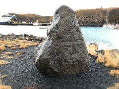 05 Sjomadurinn Stone carving of a primitive stone face by Pall Gudmundsson Stykkisholmur harbour Snaefellsnes Peninsula Iceland