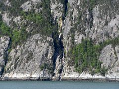 03A A Waterfall Comes Down To The Taiya Inlet In The Upper Lynn Canal From The Ferry To Haines Alaska