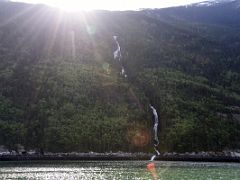 03C A Waterfall Comes Down To The Taiya Inlet In The Upper Lynn Canal From The Ferry To Haines Alaska