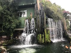 10B Water falls on the outside of the vegetarian restaurant in Nan Lian Garden Hong Kong