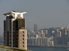 04B The 40-story Pinnacle residential skyscraper with Quarry Bay and North Point beyond from the EyeBar Kowloon Hong Kong