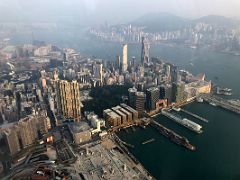 04A Looking down on Kowloon with Victoria Harbour and Hong Kong beyond from The Ozone rooftop bar Ritz-Carlton Hong Kong