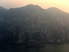 07B The skyscrapers on Hong Kong Island incl The Centre Building and Shun Tak Centre twin towers just before sunset from The Ozone rooftop bar Ritz-Carlton