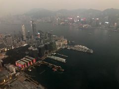 08A The lights come on Kowloon skyscrapers with Victoria Harbour and Hong Kong beyond after sunset from The Ozone rooftop bar Ritz-Carlton Hong Kong