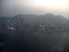 09A The evening lights are starting to illuminate the skyscrapers on Hong Kong Island just after sunset from The Ozone rooftop bar Ritz-Carlton