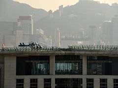 02C The Peninsula Hotel Hong Kong with a helicopter on the roof and the Felix restaurant and bar below from Eyebar iSquare