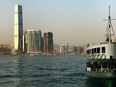 01A A Star Ferry at the Central pier with Kowloon skyscrapers International Commerce Centre ICC and The HarbourSide across Victoria Harbour Hong Kong