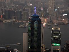 10A The Centre Building is lit up at night with the IFC Mall and Victoria Harbour and Kowloon beyond from Lugard Road Victoria Peak Hong Kong