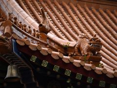 08D Carved animal ornaments on the roof of a temple building at Wong Tai Sin temple Hong Kong