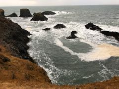 05A The sea hits the cliffs and protruding rocks of basalt columns in Arnarstapi Snaefellsnes Peninsula Iceland