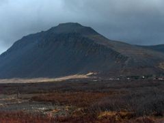 05B Driving past the mountain Hafnarfjall an extinguished volcano before Borgarnes on the drive from Reykjavik to Snaefellsnes Iceland