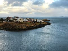 03B Looking across the small Madkavik inlet to the buildings of Stykkisholmur overlooking the ocean from Stykkisholmskirkja church on Snaefellsnes Peninsula Iceland