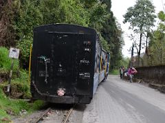 01D The Darjeeling Himalayan Railway Toy Train Is Next To The Road Near Darjeeling Near Sikkim India