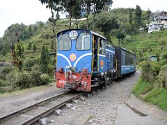 02A The Darjeeling Himalayan Railway Toy Train Arrives At Batasia Loop In Darjeeling Near Sikkim India