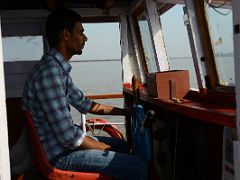 13 Pilot Steers The Boat Toward Elephanta Island