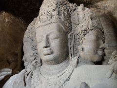 49 Trimurti Right Shiva With Sensuous Lips Embodying Life And Vitality, Centre Benign Meditative Preserver Vishnu, Left Face Displaying Anger Bhairava In The Main Cave At Mumbai Elephanta Island