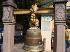 06B Bell And Carved Figure At Entrance To Buddha Giving His First Sermon At Mulagandha Kuti Vihara Sarnath India