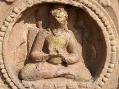 05A Small Buddha Carving On The Side Of The Main Temple At Sarnath Archeological Excavation Site India