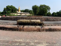 06A Dharmarajika Stupa Was Built by Ashoka In 3C BC With Jain Temple Behind At Sarnath Archeological Excavation Site India