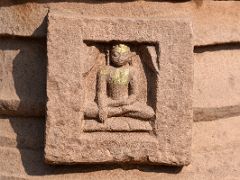 07B Buddha Carving On A Stupa In Courtyard At Sarnath Archeological Excavation Site India