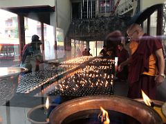 08 Buddhist Monks Manage Prayer Lamps At Do Drul Chorten Monastery In Gangtok Sikkim India