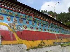 03B Prayer Wheels And Murals Adorn A Wall At Rumtek Gompa Monastery Near Gangtok Sikkim India