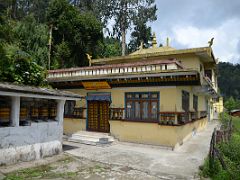 09B Prayer Wheels And Karma Cholhor Tashiling Yellow Building At Rumtek Gompa Monastery Near Gangtok Sikkim India