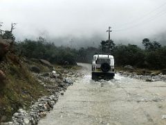 02A Water Flows Across The Road Between Lachung And Yumthang Valley Of Flowers Sikkim India