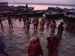01D Pilgrims Wade Into The Ganges River Before Sunrise At Dashashwamedh Ghat On The Banks Of The Ganges River Varanasi India