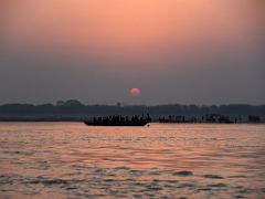 05A The Sun Glows Bright Red At Sunrise Over The Ganges River Varanasi India