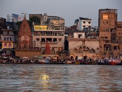 10A Boats And People Line The Shore Near Dashashwamedh Ghat After Sunrise From A Tourist Boat On The Ganges River Varanasi India