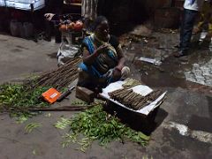 01C Neem Wood Sticks Are Used As A Toothbrush Early Morning Haircut On The Crowded Street Of Varanasi Old Town India