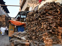 08A Wood Is Stacked Ready For Cremation At The Manikarnika Burning Ghat Varanasi India
