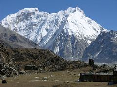Kangchenjunga 04 02 Tent Peak and Nepal Peak  from Lhonak The best view of Tent Peak (7365m, also called Kirat Chuli) to the left and Nepal peak (7168m) to the right are from Lhonak. Further up at Pangpema; a ridge…