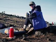 06 Jerome Ryan Drinks His Tea While The Camp Is Taken Down At Shira Camp Early Morning On Day 3 Of The Machame Route Climbing Mount Kilimanjaro Kili October 2000