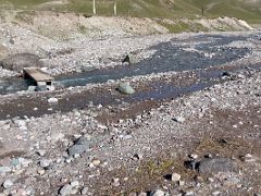 02B We crossed the small stream next to base camp on a wooden bridge on the day hike to Pik Petrovski from Ak-Sai Travel Lenin Peak Base Camp 3600m