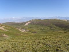 05A Rolling green hills from the bottom of the steep ascent to the shoulder ridge of Pik Petrovski on day hike from Ak-Sai Travel Lenin Peak Base Camp 3600m