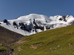 05B The icy summit of Pik Petrovski about 4800m from the bottom of the steep ascent to the shoulder ridge on day hike from Ak-Sai Travel Lenin Peak Base Camp 3600m